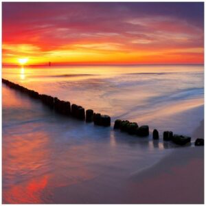 Wallario Möbelfolie Farbenspiel im Himmel - Sonnenuntergang am Strand