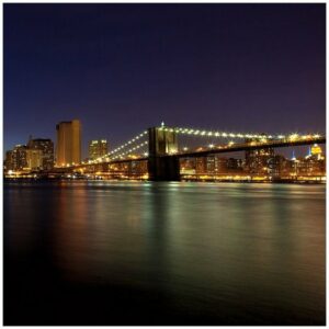 Wallario Möbelfolie New York Skyline - Brooklyn Bridge und Manhattan am Abend