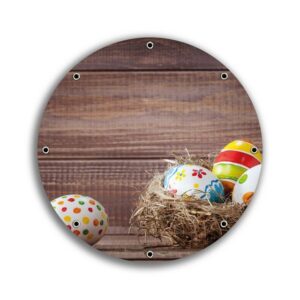 Wallario Sichtschutzzaunmatten Bunte bemalte Eier an Ostern im Vorgelnest vor hölzerner Wand, rund